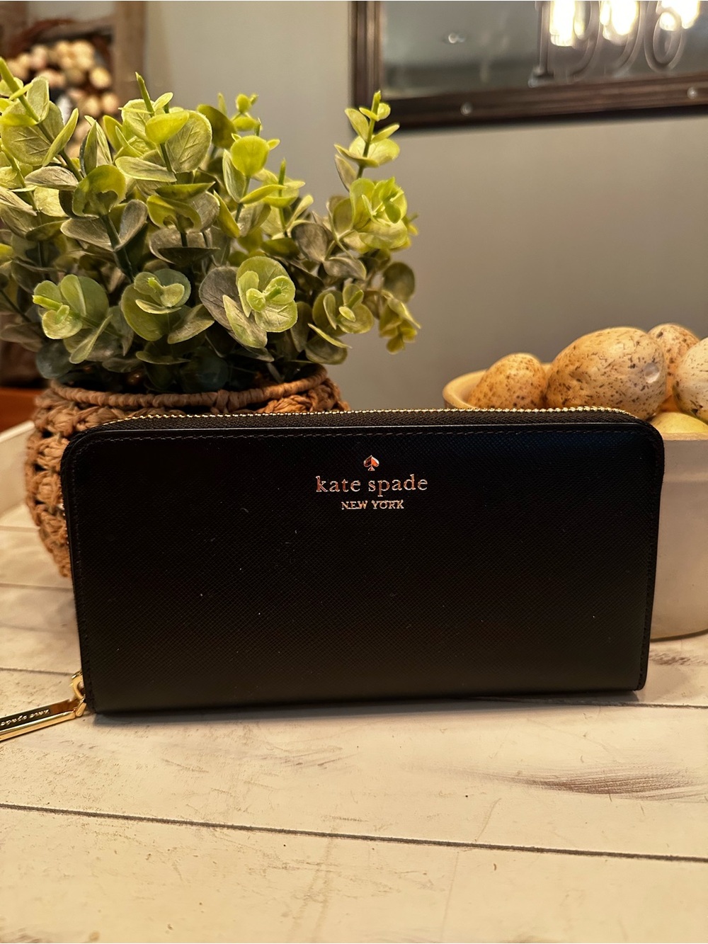 kate spade black zip-around leather wallet with gold logo